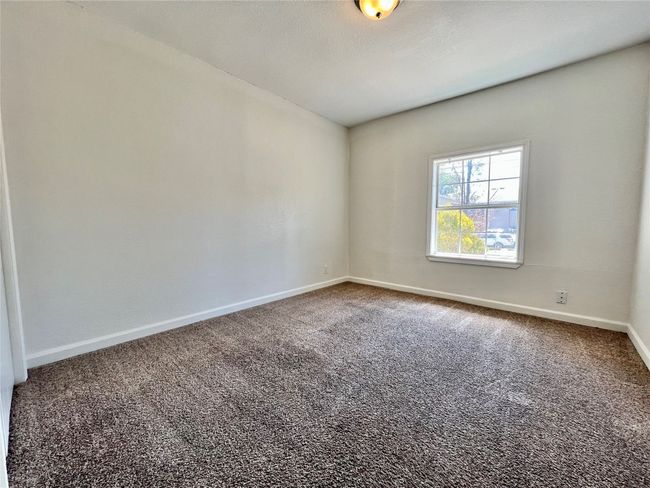 Empty room featuring baseboards and carpet floors | Image 12