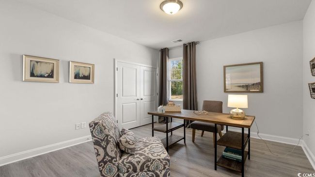 Office area with baseboards and wood finished floors | Image 31