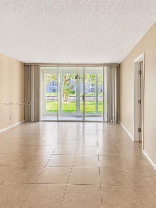 p107-8340 Sands Point Blvd, Tamarac, FL, 33321-3887 | Card Image