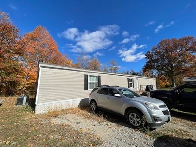 View of home's exterior with central AC unit | Image 3