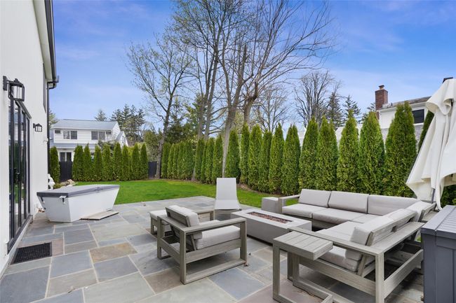 View of patio / terrace with an outdoor living space with a fire pit | Image 30