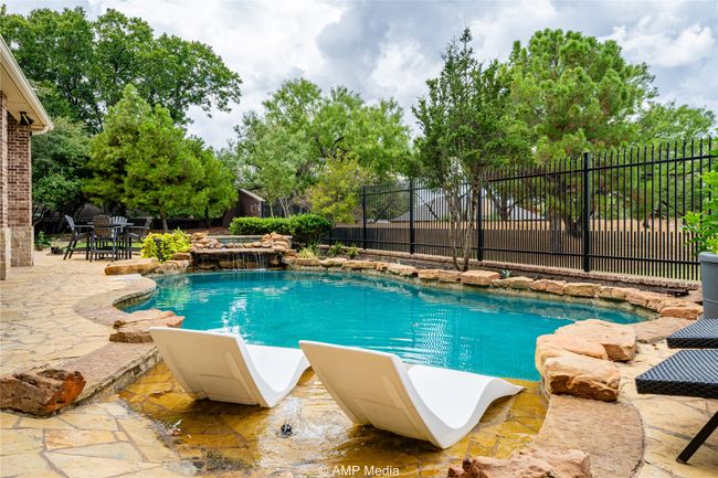 View of pool featuring a patio area | Image 30