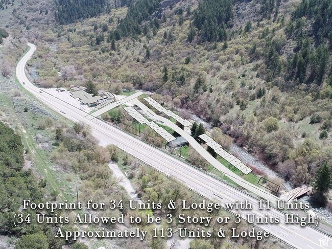 Drone / aerial view featuring a view of trees | Image 8