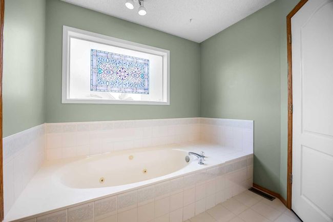 240 Arbour Ridge Way Nw, House other with 6 bedrooms, 4 bathrooms and 4 parking in Calgary AB | Image 24
