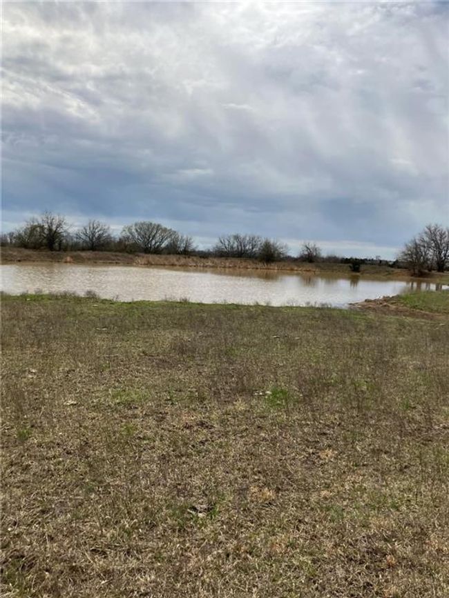 View of yard featuring a water view | Image 26