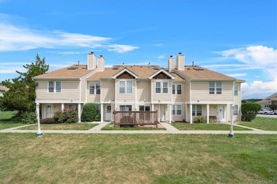 View of front facade featuring a Patio and a front yard | Image 1