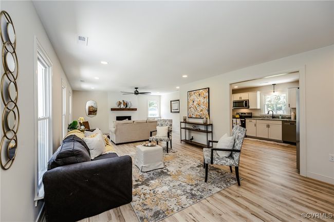 Living Room Opens to Family Room Area | Image 11