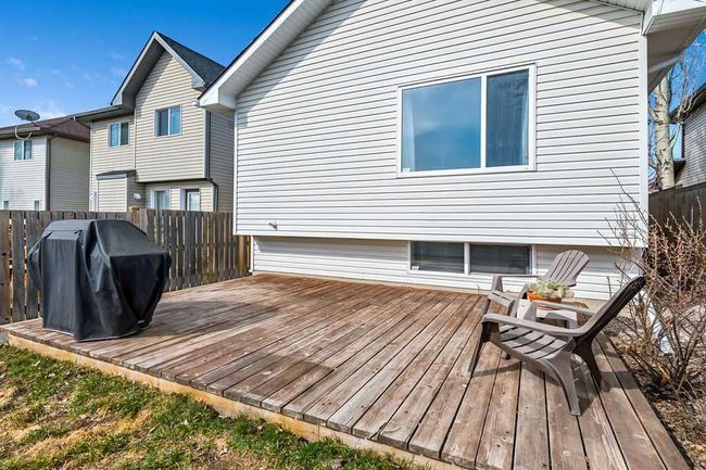 89 Crystal Shores Crescent, Home with 3 bedrooms, 2 bathrooms and 1 parking in Okotoks AB | Image 30