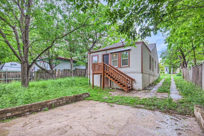 Back of property featuring a patio and a fenced backyard | Image 28
