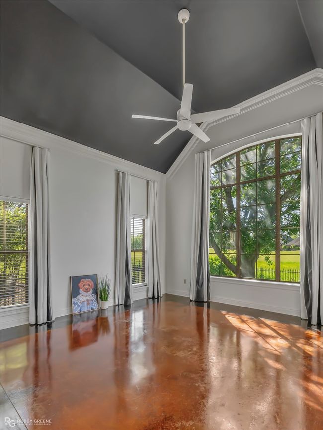 Secluded master bedroom suite. | Image 12