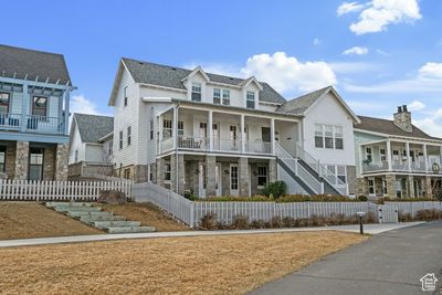 View of front of home with a balcony | Image 1