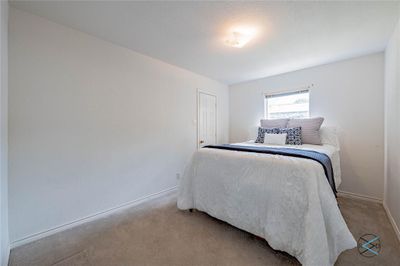 View of carpeted bedroom | Image 2