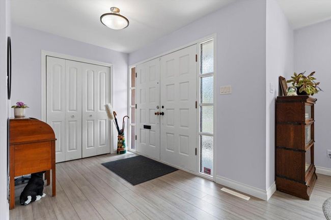 Foyer entrance featuring light wood-style flooring | Image 10