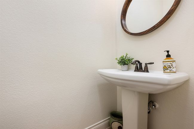 Half bath featuring a pedestal sink | Image 22