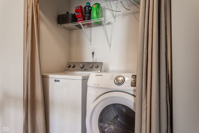 Upstairs laundry area. | Image 20