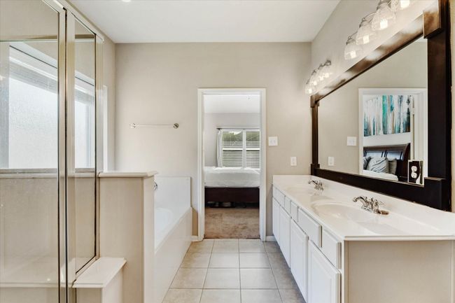 Primary bathroom looking into the bedroom | Image 11