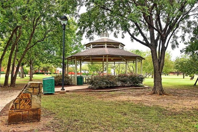 View of property's community featuring a gazebo and a yard | Image 26