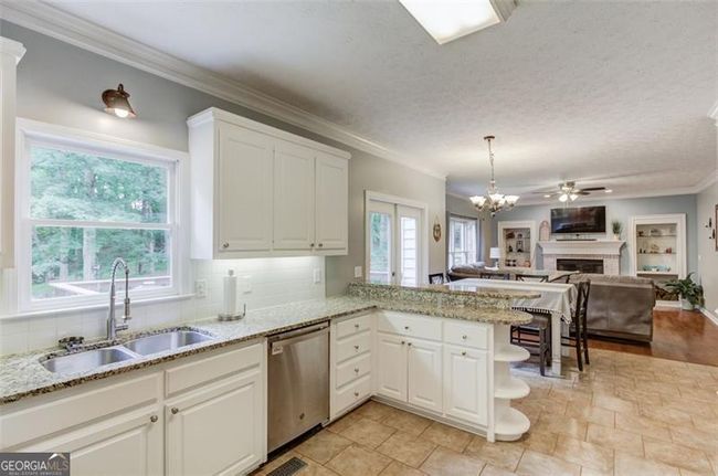 1180 Windridge Dr, House other with 4 bedrooms, 4 bathrooms and 2 parking in Loganville GA | Image 12