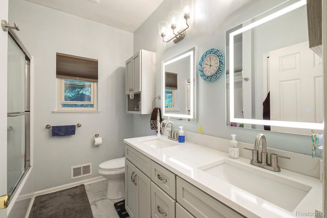 Full updated bathroom with dual sinks | Image 14