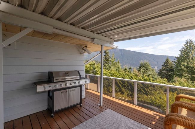 Deck featuring a mountain view | Image 18