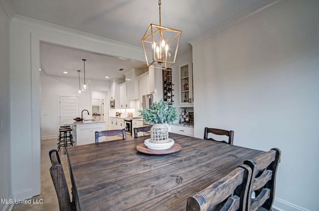 Dining view into kitchen | Image 11