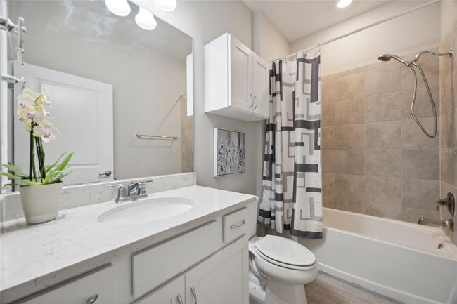 Bath with upgraded tile, shower and tub | Image 25