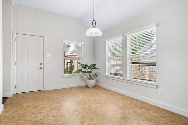 Breakfast area with door to back patio | Image 19