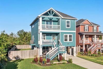 Enjoy front porch or primary suite balcony for water views! | Image 3