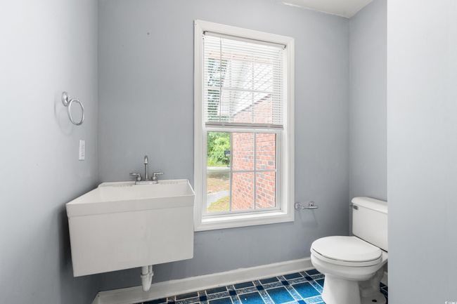 Bathroom with plenty of natural light and tile patterned flooring | Image 4