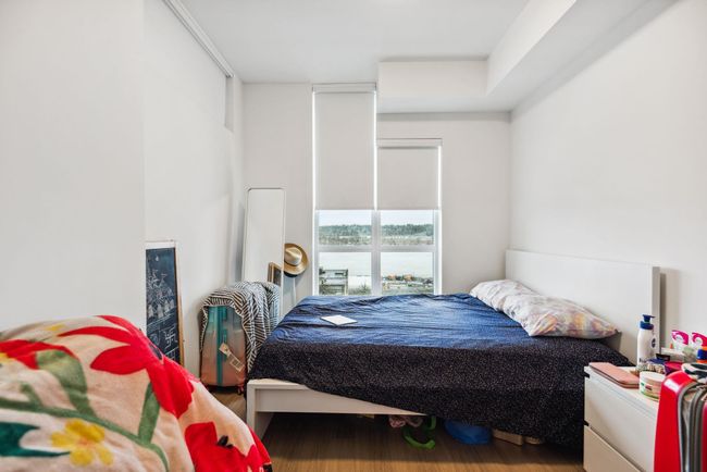 Bedroom featuring wood finished floors | Image 14