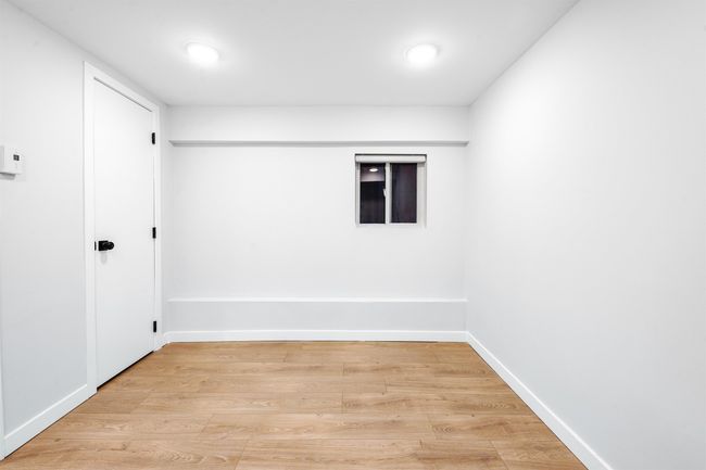 Unfurnished room featuring light wood-type flooring and baseboards | Image 9