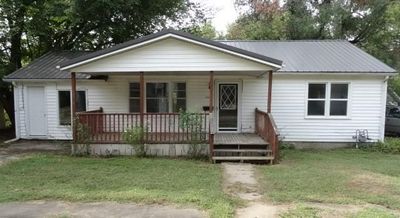 View of front of property with a front lawn and a porch | Image 1