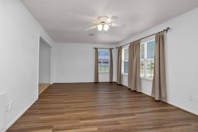 Huge Living room with New composite wood flooring. | Image 7