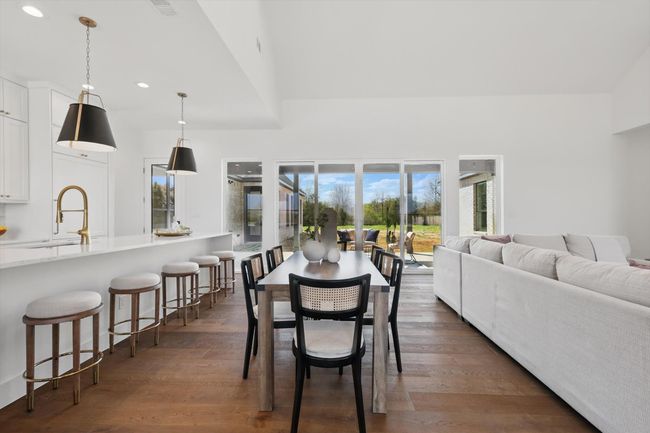 Dining area with visible vents, wood finished floors, and recessed lighting | Image 4