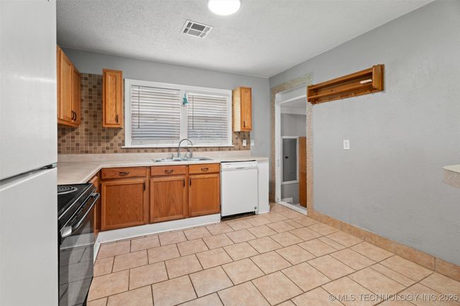 345 N Pine St, House other with 3 bedrooms, 1 bathrooms and null parking in Dewey OK | Image 11