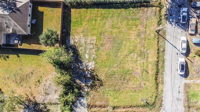 Aerial view of lots. Bottom of photo represents north side of property. Right side street is Sam Wilson. | Image 8