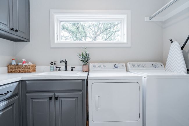 Cabinet space, counter space and a sink | Image 14