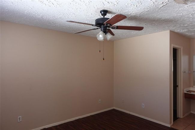 Spacious master bedroom. | Image 11