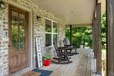 Enjoy the views of beautiful sunrises on the wrap around porch. | Image 2