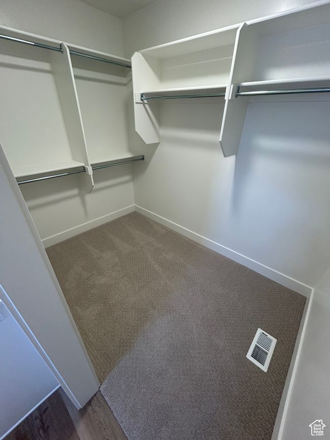 View of walk in closet | Image 10