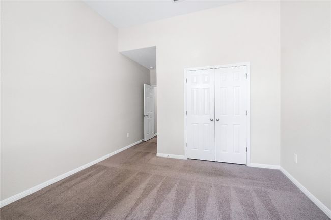 Unfurnished bedroom featuring carpet and a closet | Image 31