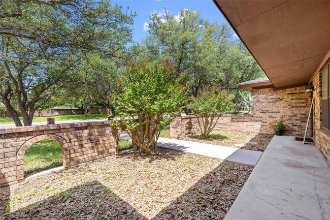 View of front patio and landscaping | Image 7