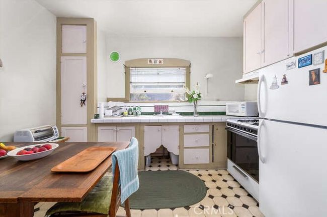 Kitchen view with sink | Image 15