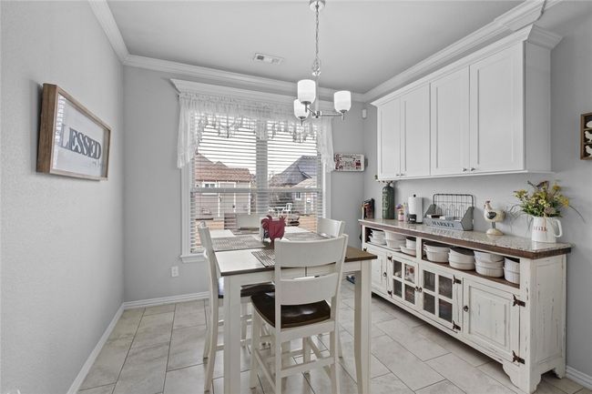 Spacious breakfast room just off the kitchen. | Image 14