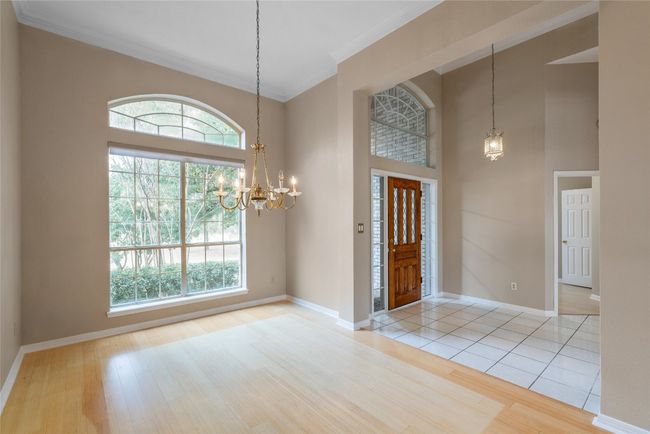 Formal Dining Room with vaulted ceilings | Image 5