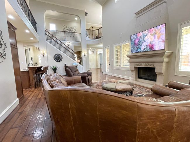 Family room looks on to stairway | Image 14