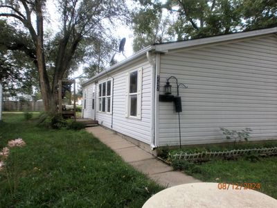 View of home's exterior with a lawn | Image 1