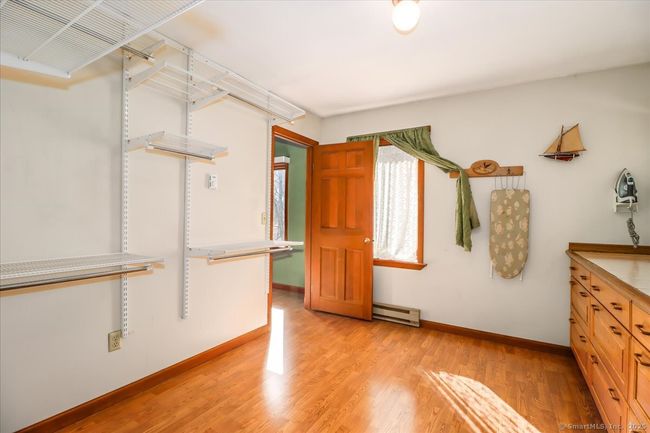 Massive walk-in closet and storage space off the main bedroom also connects to the main bathroom. | Image 36