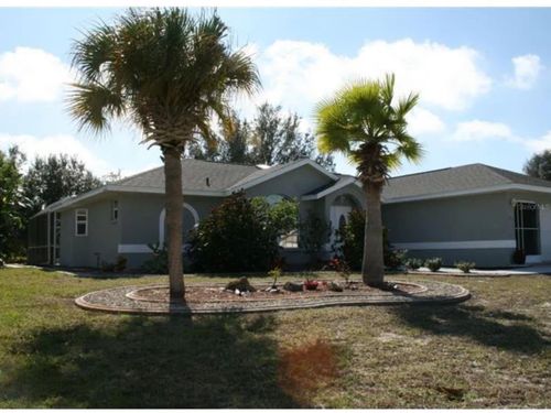103 Mark Twain Ln, Rotonda West, FL, 33947-2142 | Card Image