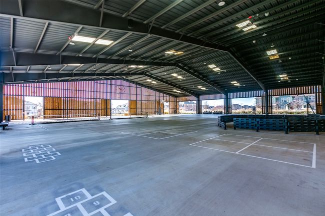 The Arena’s south side features covered sport courts with basketball, pickleball and more as it opens up onto a large outdoor green space. | Image 33